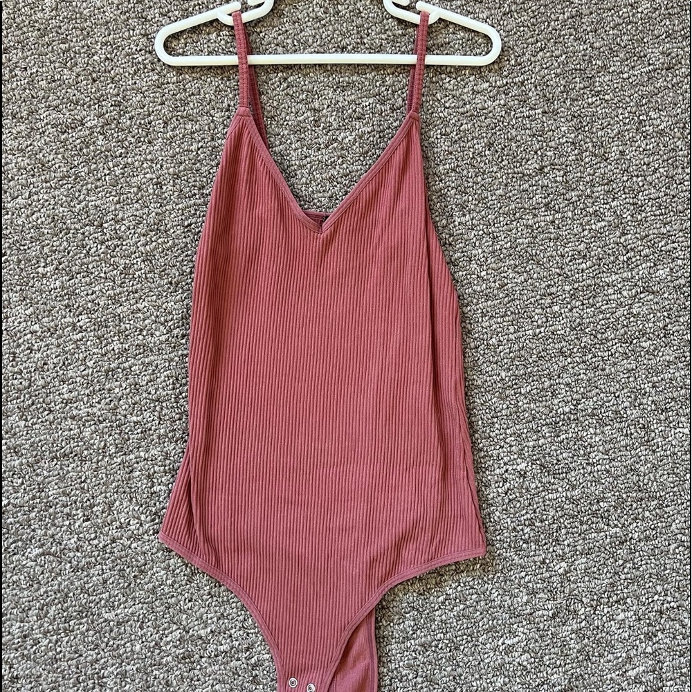 Pink ribbed bodysuit